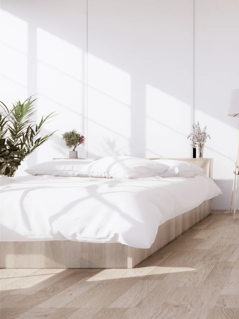 3-bedroom-others Sunlit bedroom with a white bed, white wall and potted plants